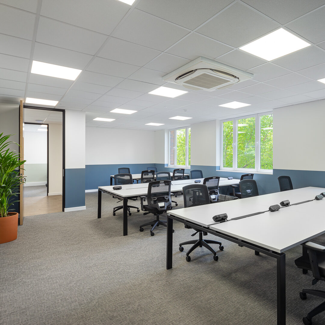 Private space for individuals who want their own dedicated desk in a shared workspace in Wimbledon, featuring ergonomic chairs, personal power access, and a modern, quiet environment.