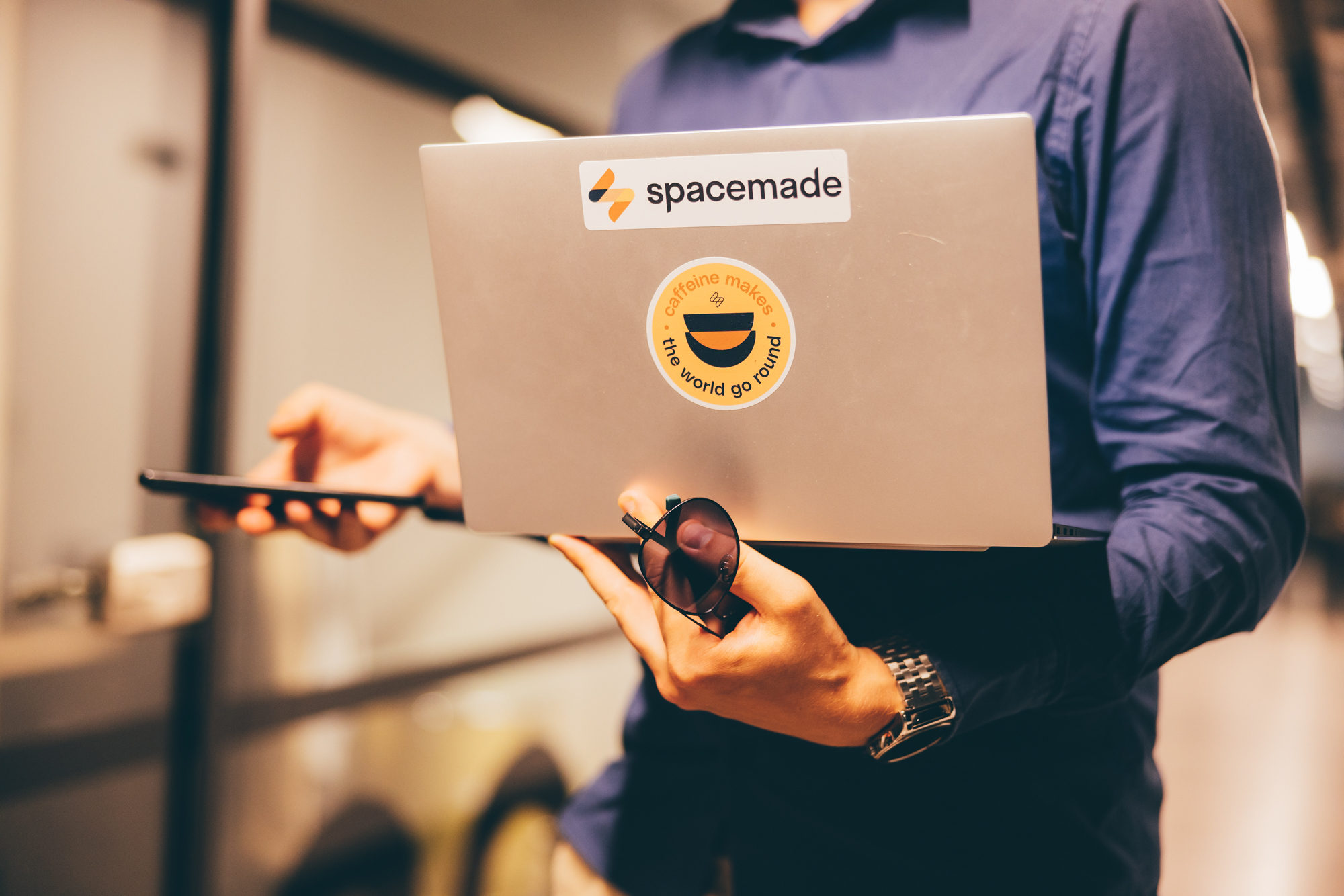 Man on Spacemade laptop on using App