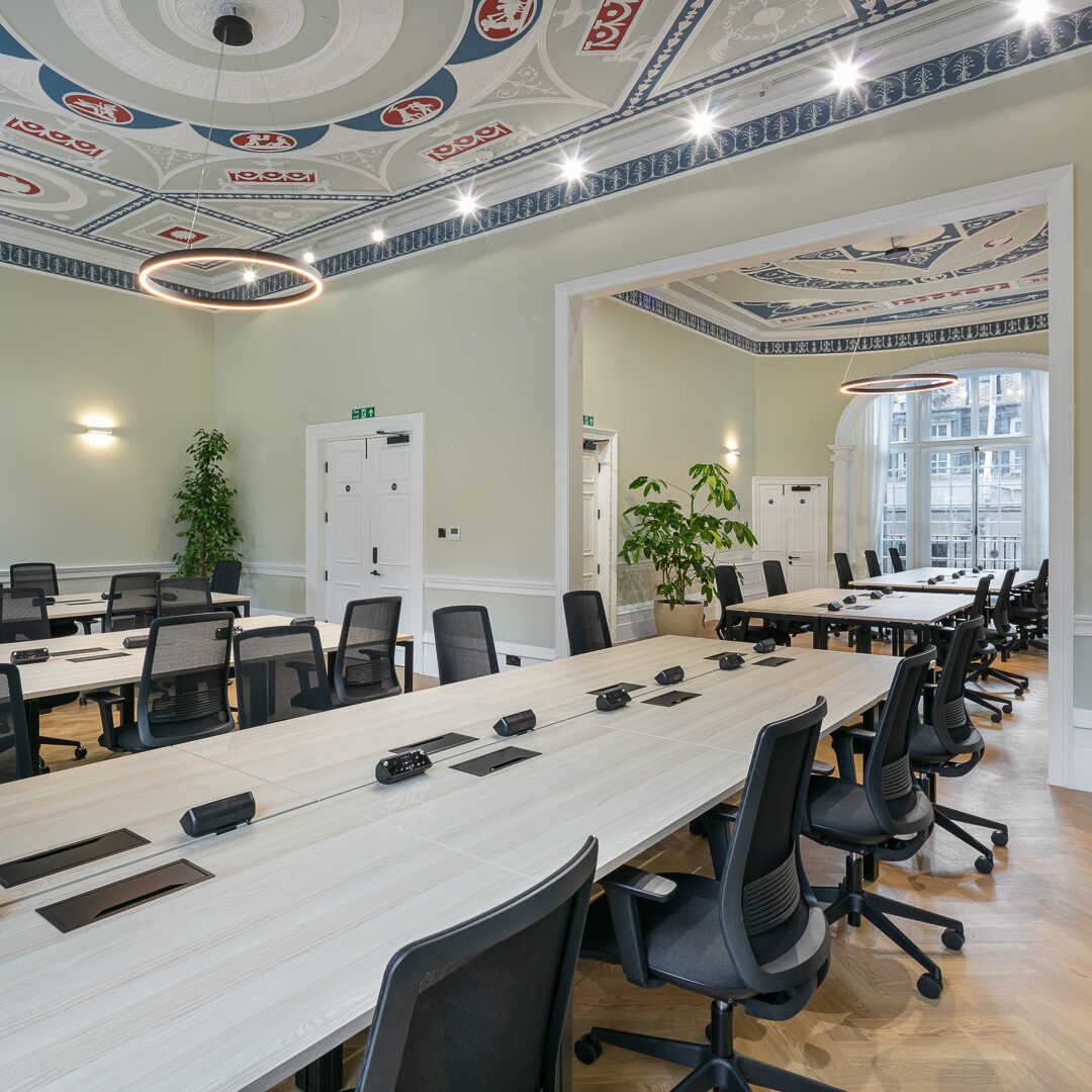 Elegant large private office with heritage detailing in Marylebone, featuring space for over 30 desks, ornate high ceilings, modern ergonomic furniture, and natural light from tall sash windows.