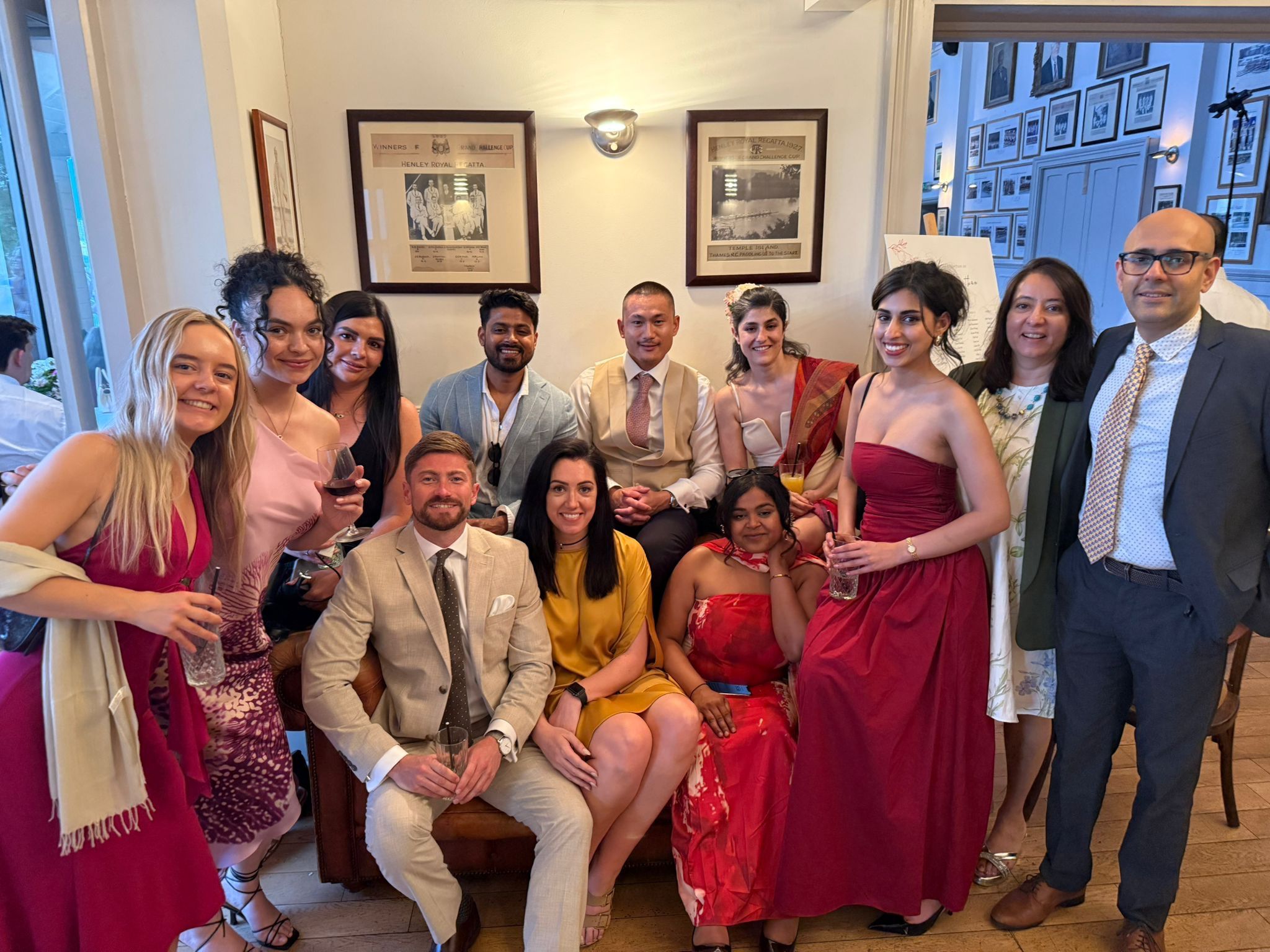 A group of people, who met at Spacemade, taking a picture at one of the member's wedding.